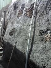 Projection de béton à la main